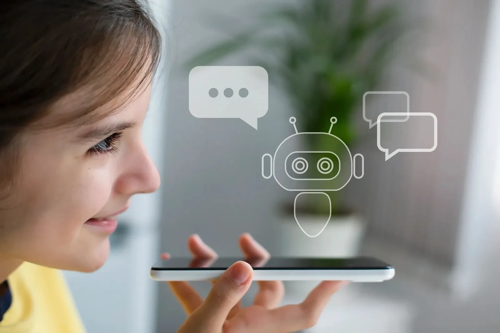 A girl interacts with a virtual chatbot on her smartphone.